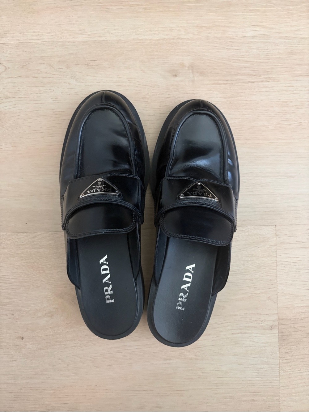 Prada Black Patent Leather Backless Loafers with Logo Plaque